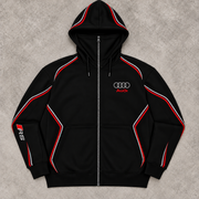 Audi RS hoodie front view — silver Audi rings and red Audi chest logo, RS sleeve branding, red and white piping