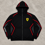 REVLINE Ferrari black and red zip hoodie on grey concrete background