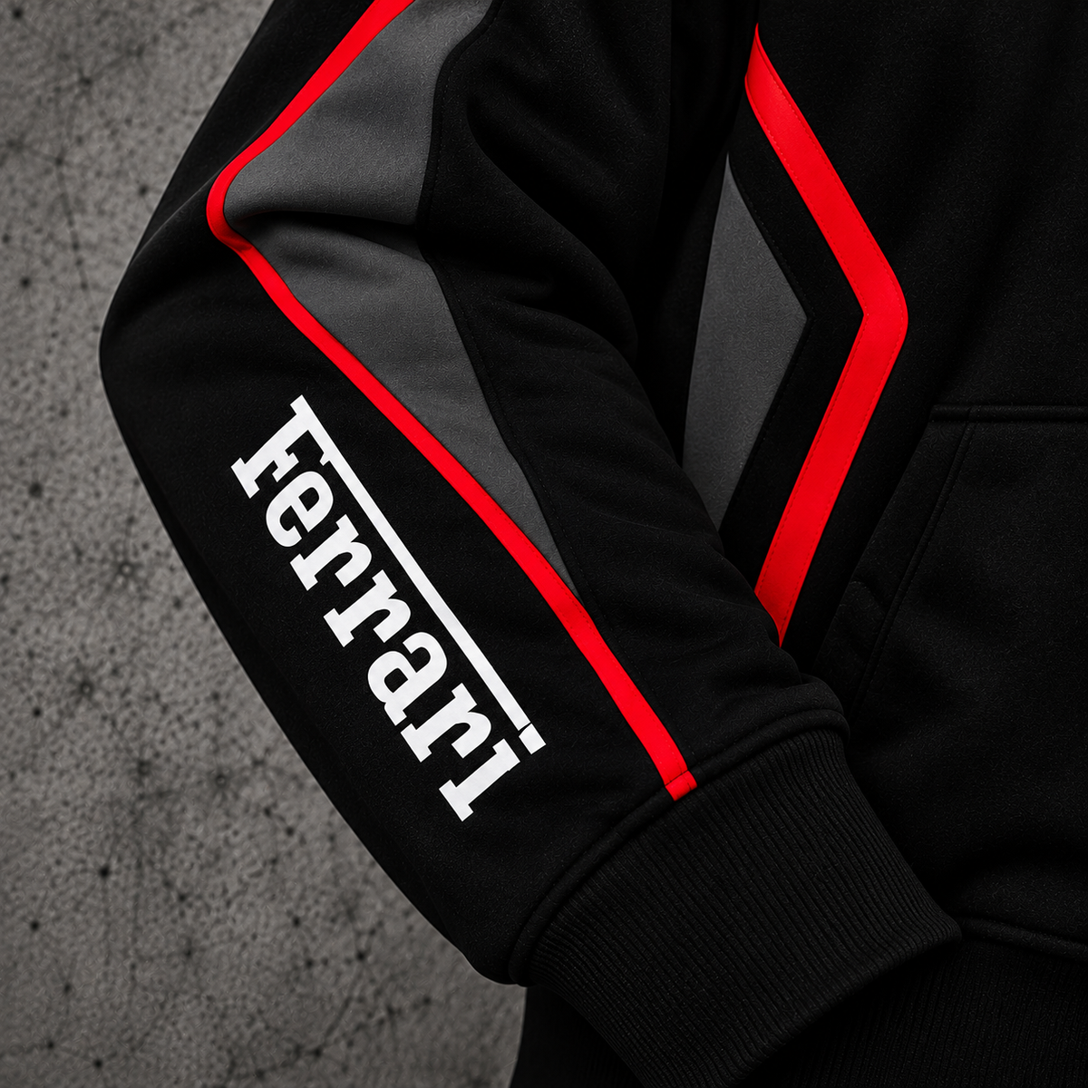REVLINE Ferrari black and red hoodie right sleeve close-up white Ferrari lettering charcoal panels and red piping
