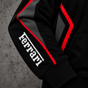 REVLINE Ferrari black and red hoodie right sleeve close-up white Ferrari lettering charcoal panels and red piping